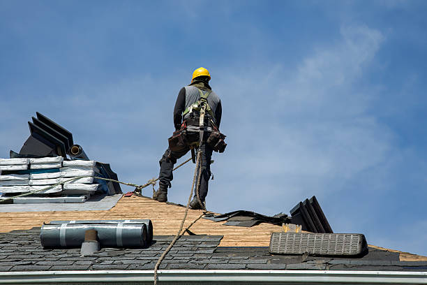 Professional Roof Replacement technician working in Buchanan, VA